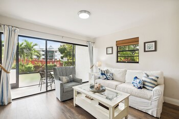 Premium Condo, 2 Bedrooms, Lanai | Living area | 29-inch TV with cable channels at Park Shore Resort