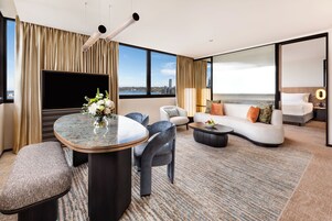 Premier River View Suite | In-room safe, desk, laptop workspace, soundproofing