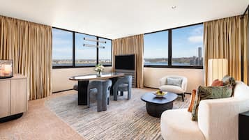 Premier River View Suite | Living area | LCD TV, pay movies