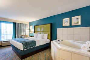 Premium bedding, desk, laptop workspace, blackout drapes