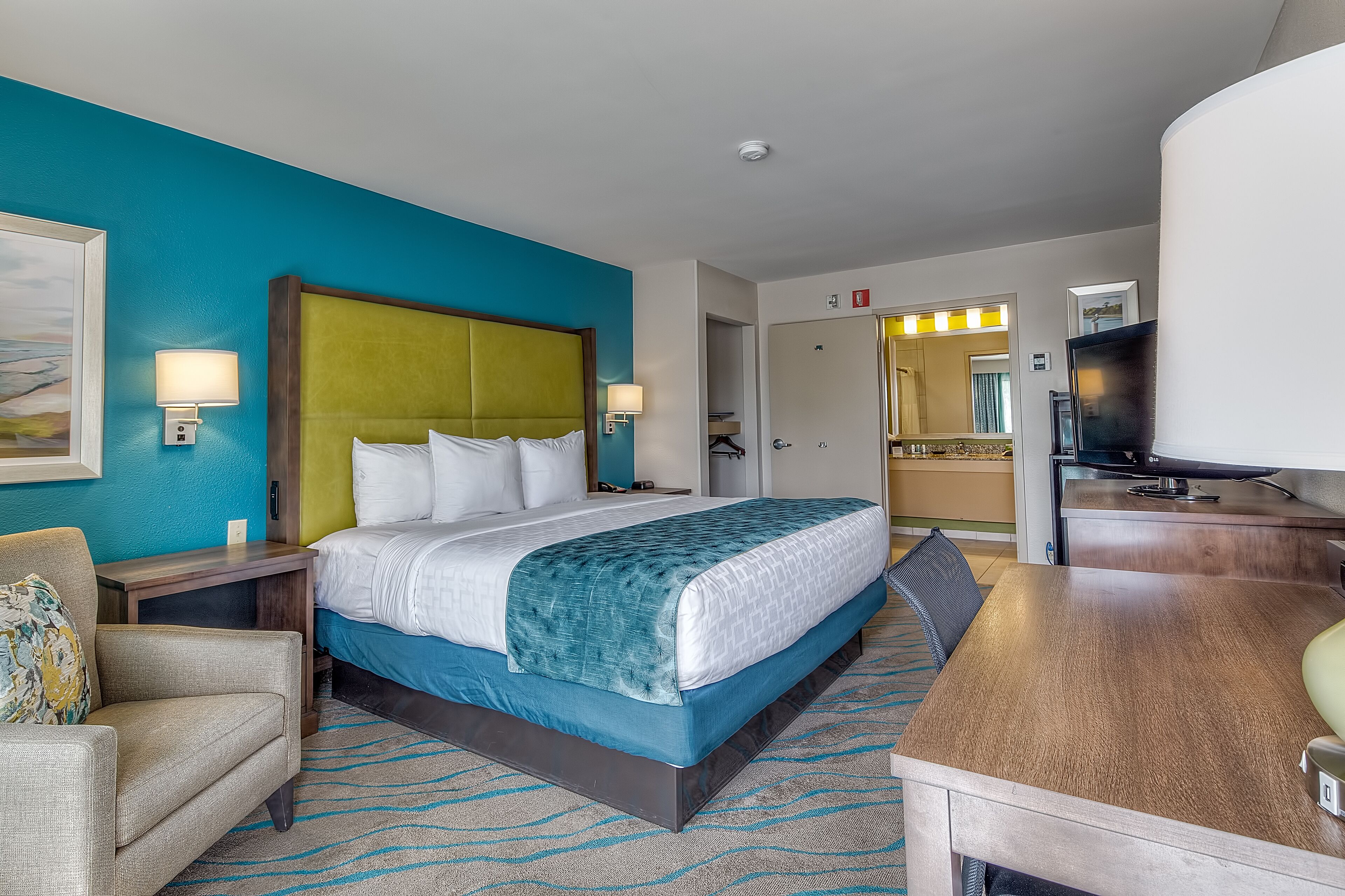 premium bedding, desk, laptop workspace, blackout curtains