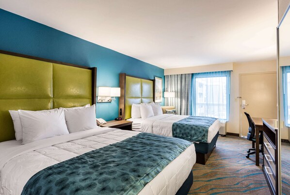 Premium bedding, desk, laptop workspace, blackout curtains