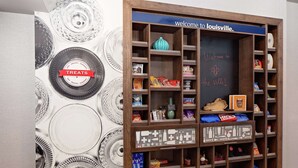 A snack display with a sign reading "Welcome to Louisville." - Hampton Inn Louisville Downtown (Louisville)