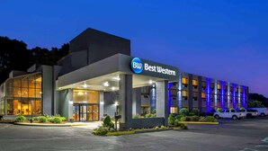 A hotel with a modern design, featuring a prominent 'Best Western' sign, large windows, and a well-lit entrance. - Best Western Danbury/Bethel (Bethel)