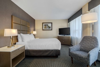 Superior Room, 1 King Bed, Non Smoking, Balcony | Hypo-allergenic bedding, in-room safe, desk, laptop workspace at Best Western Premier Chateau Granville Hotel & Suites & Conf. Centre