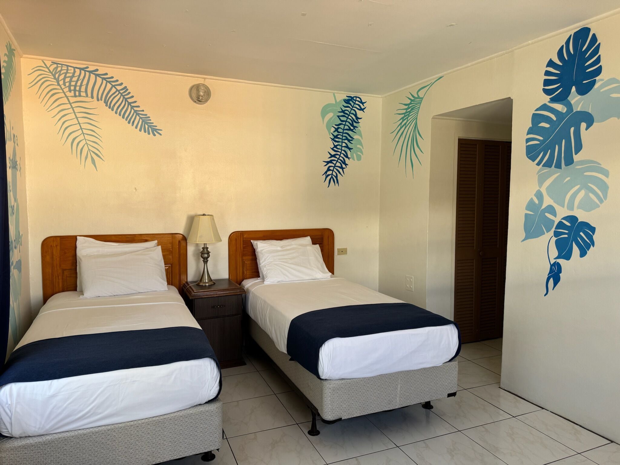 Signature Twin Room, City View | In-room safe, desk, laptop workspace, soundproofing
