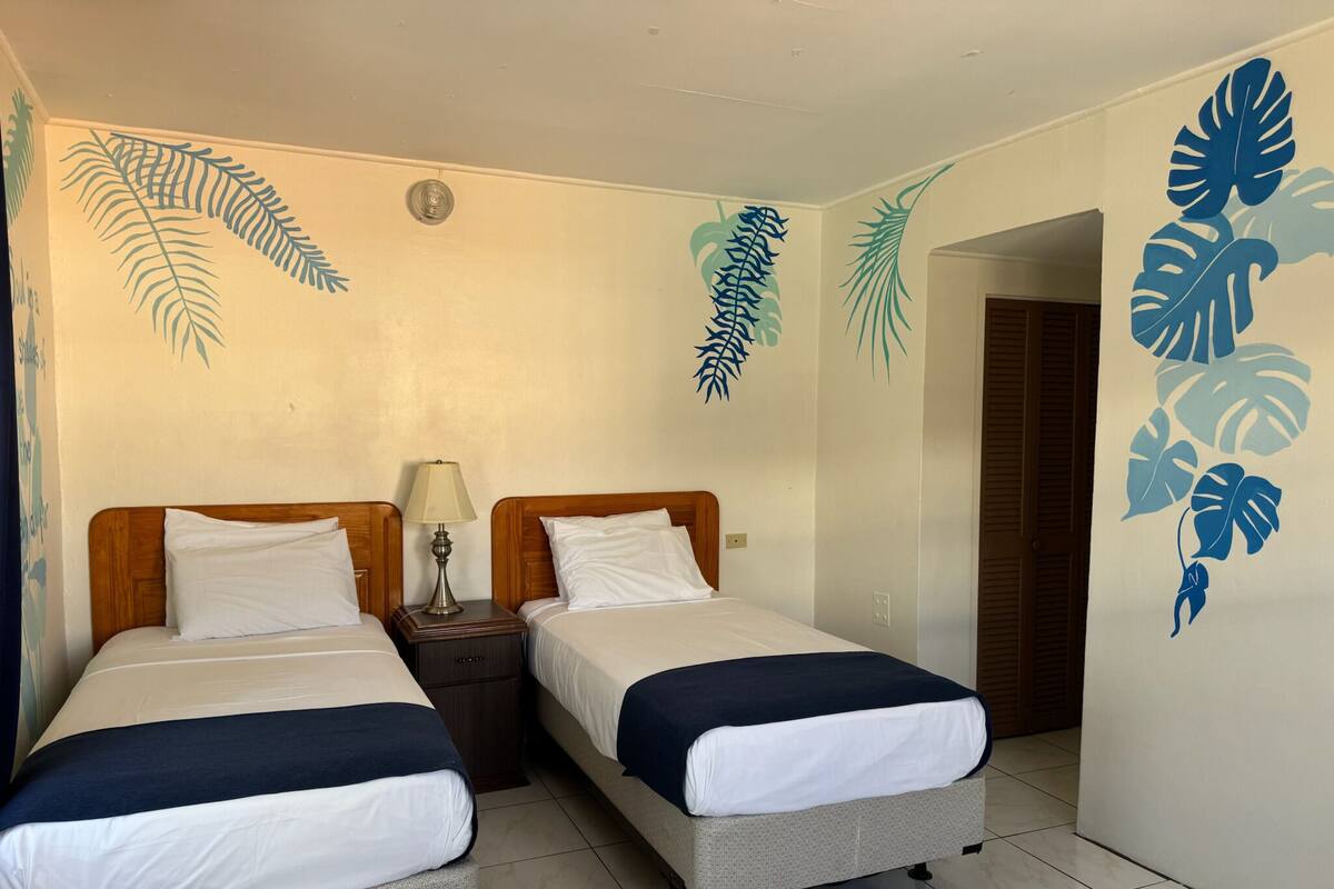Signature Twin Room, City View | In-room safe, desk, laptop workspace, soundproofing