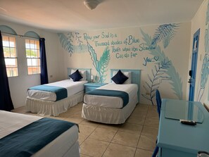 Signature Quadruple Room | In-room safe, desk, laptop workspace, soundproofing - Seaview Beach Hotel (Philipsburg)