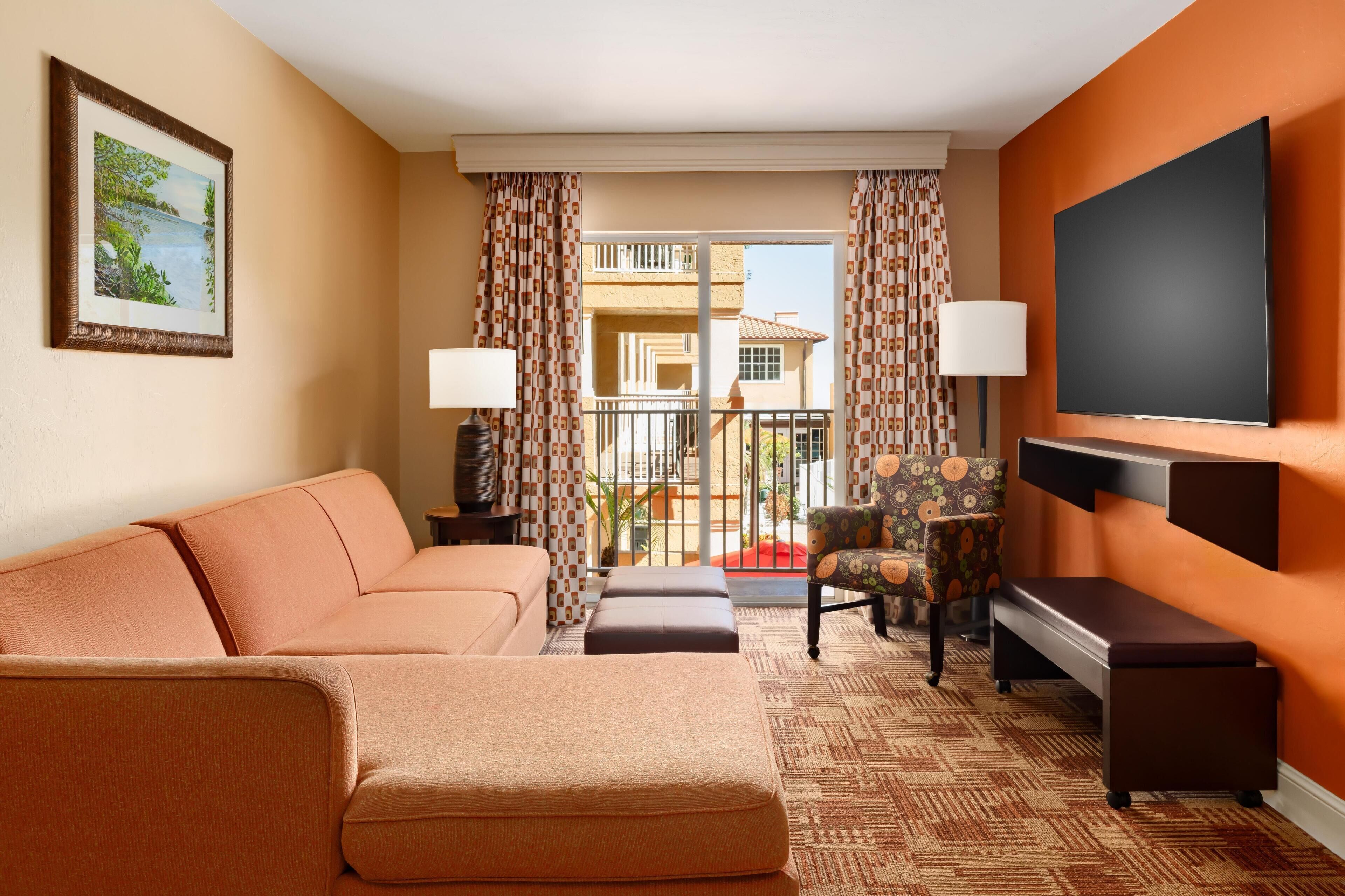 Suite, 1 Bedroom | Living area | 40-inch flat-screen TV with cable channels, TV