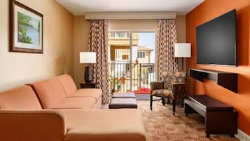 Suite, 1 Bedroom | Living area | 40-inch flat-screen TV with cable channels, TV