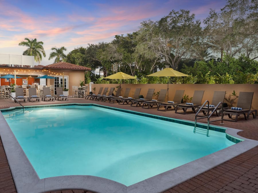 Outdoor pool, pool umbrellas, sun loungers