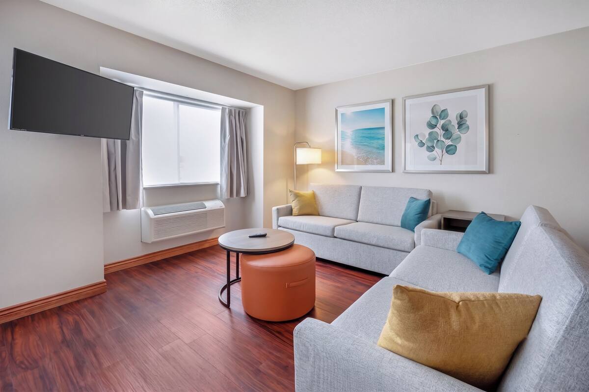 Suite, Multiple Beds, Non Smoking (Efficiency) | Living area | 50-inch LCD TV with cable channels, TV