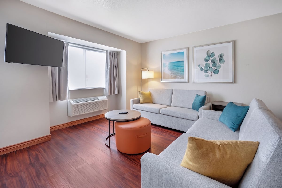 Suite, Multiple Beds, Non Smoking (Efficiency) | Living area | 50-inch LCD TV with cable channels, TV
