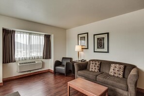 Suite, 1 King Bed with Sofa bed, Non Smoking (Efficiency) | Living area | 50-inch LCD TV with cable channels, TV