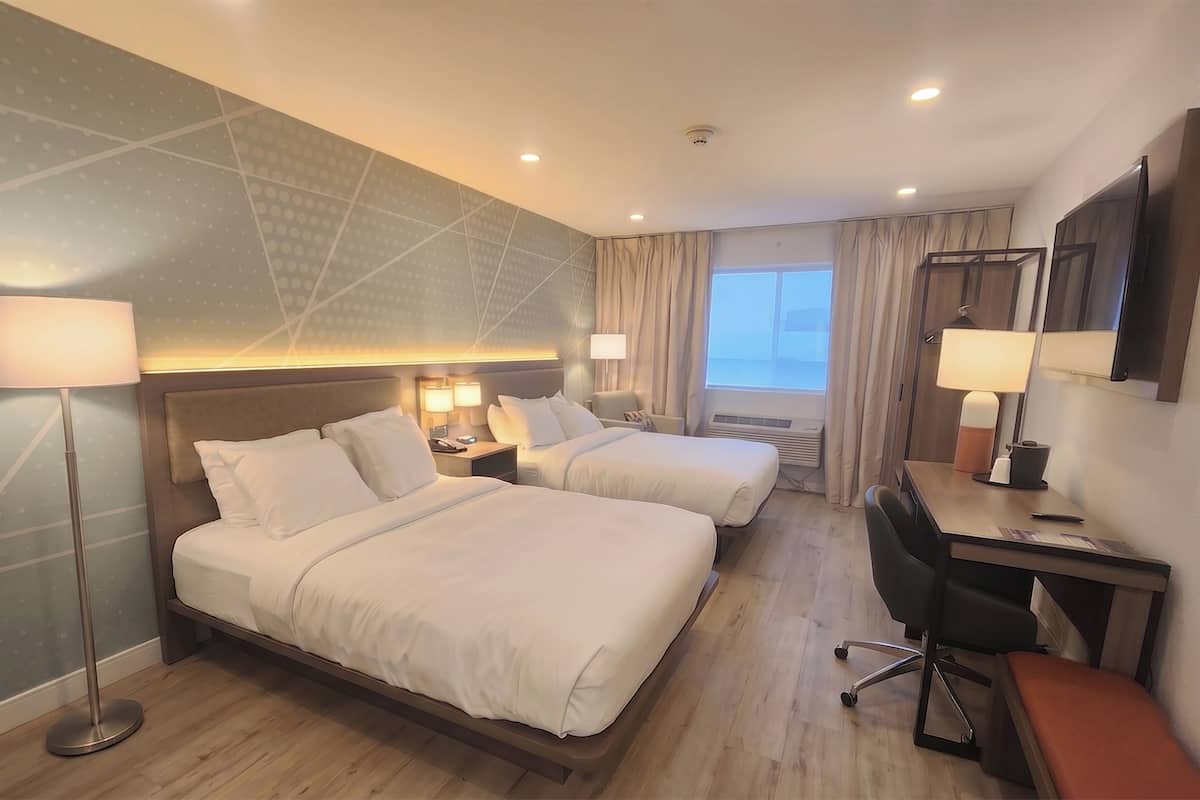 Standard Room, 2 Queen Beds, Non Smoking | Desk, laptop workspace, iron/ironing board, WiFi (free)