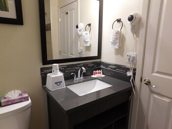 Standard Room, 1 King Bed, Fireplace | Bathroom sink at Days Inn by Wyndham Monterey-Fishermans Wharf Aquarium