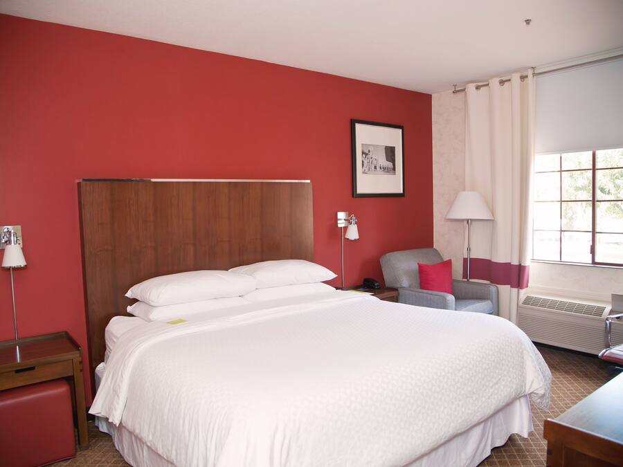 Premium bedding, down comforters, memory foam beds, minibar