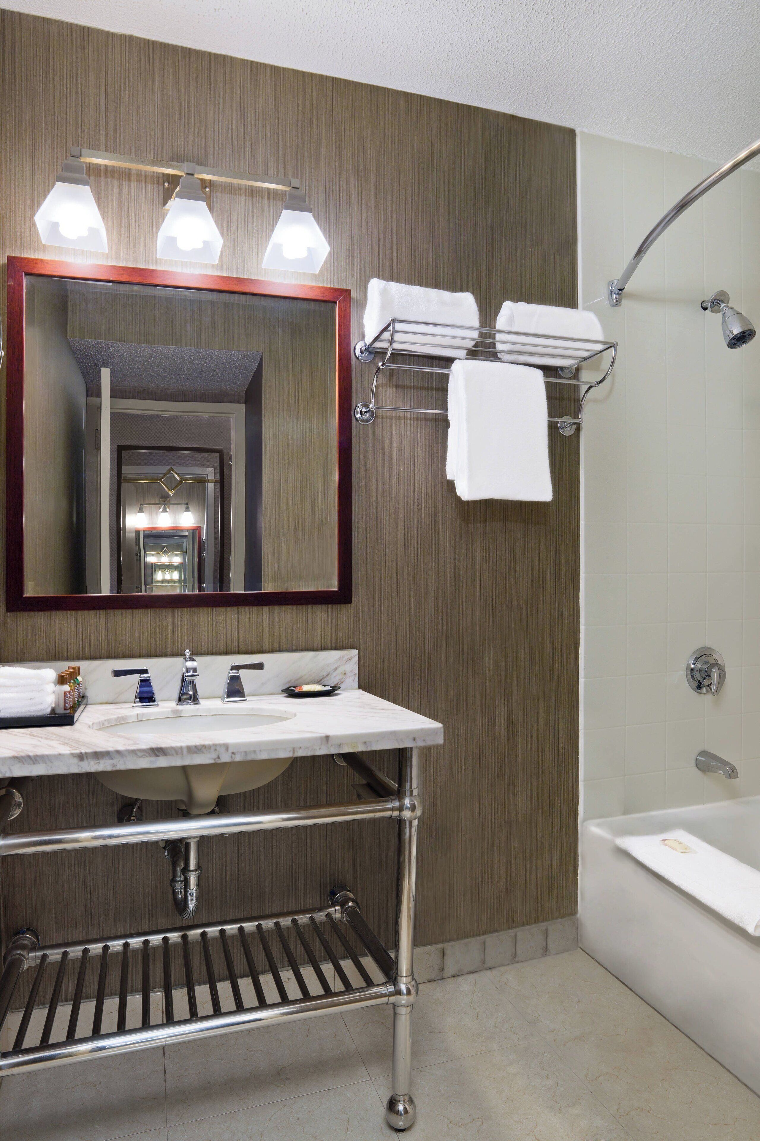 combined shower/bathtub, free toiletries, hair dryer, towels