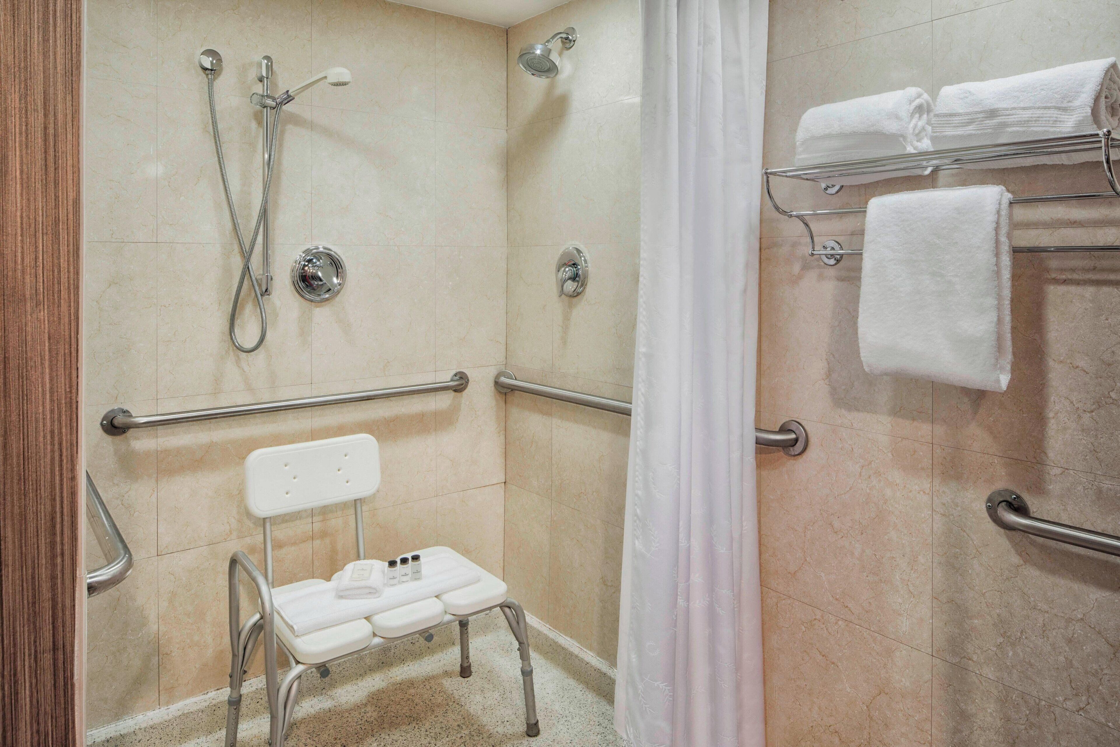 combined shower/bathtub, free toiletries, hair dryer, towels