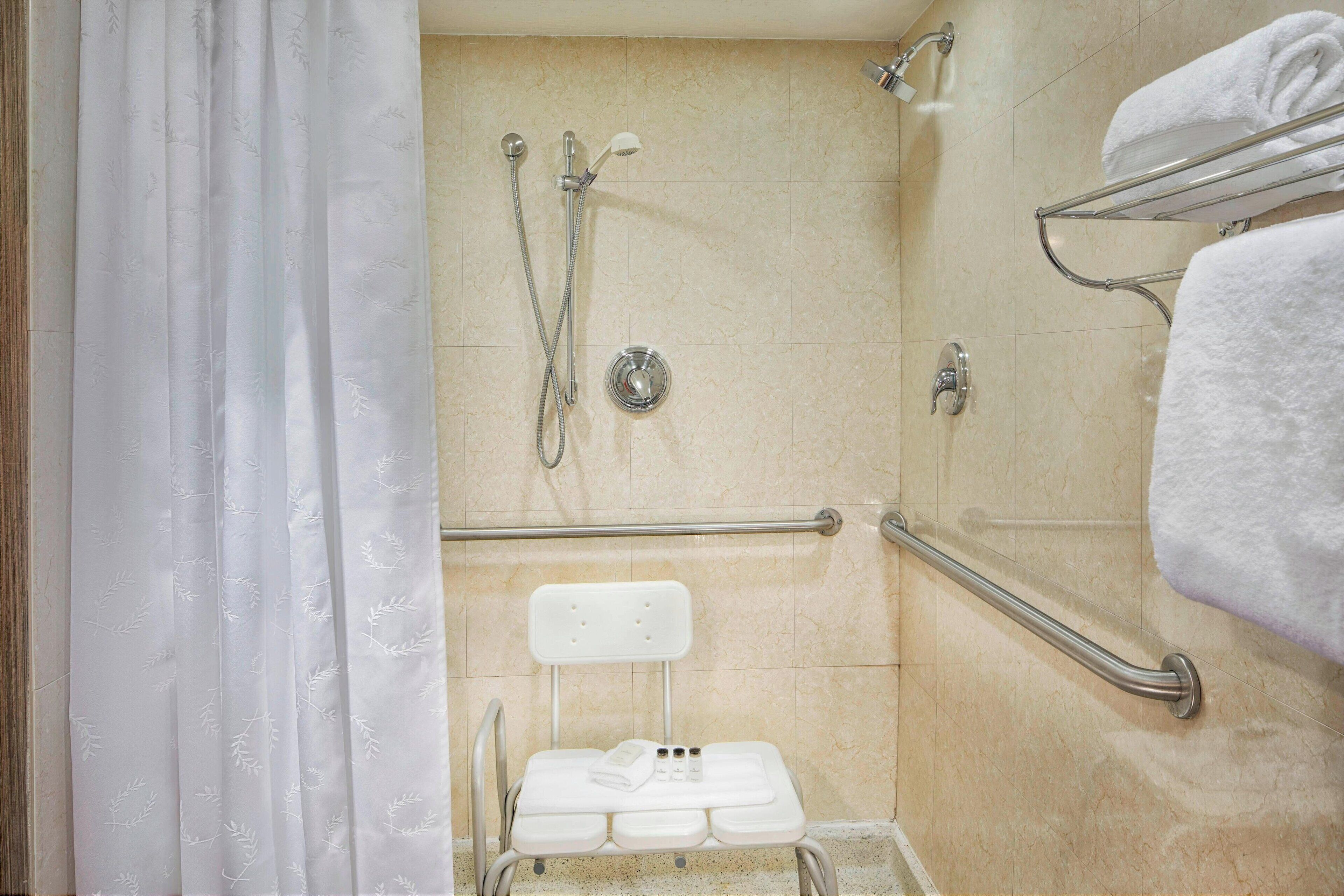combined shower/bathtub, free toiletries, hair dryer, towels