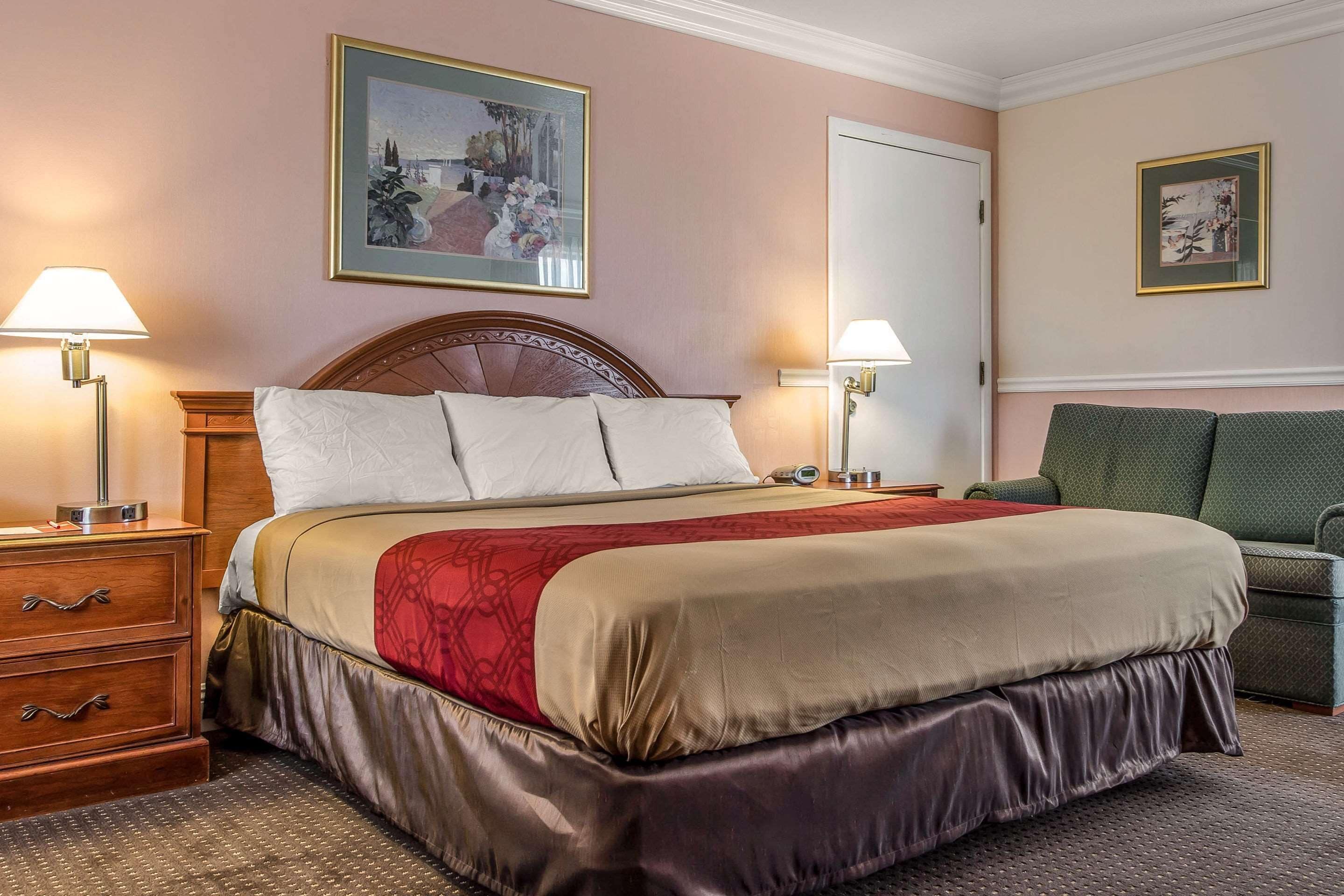 Desk, laptop workspace, blackout drapes, iron/ironing board