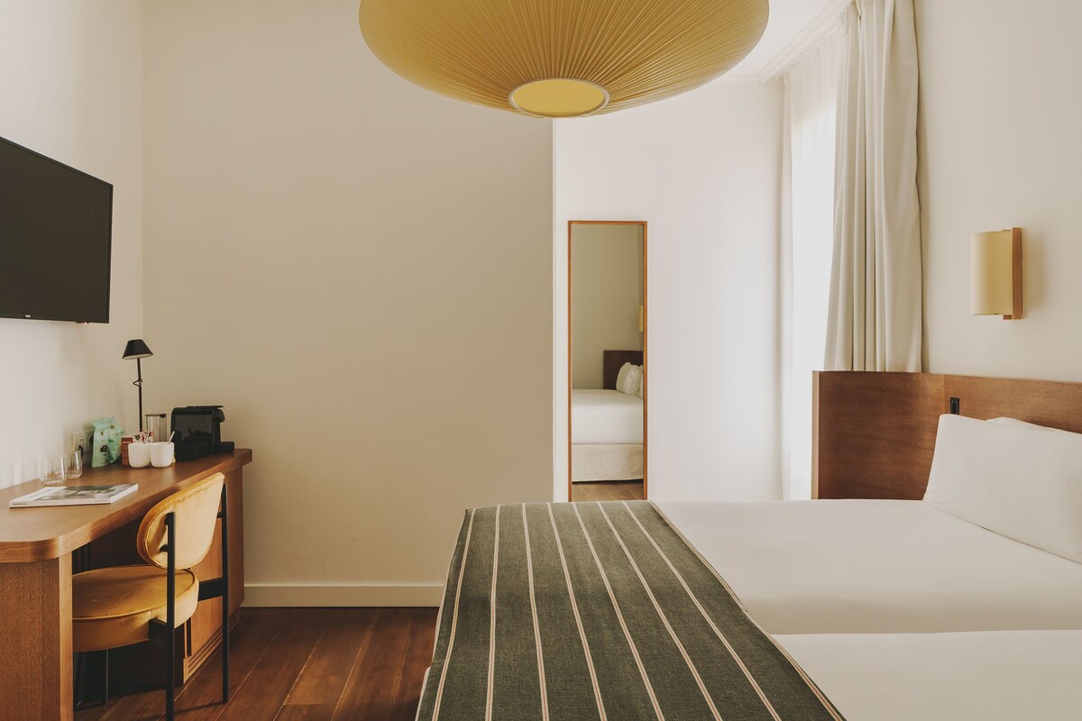 Ropa de cama de alta calidad y minibar 