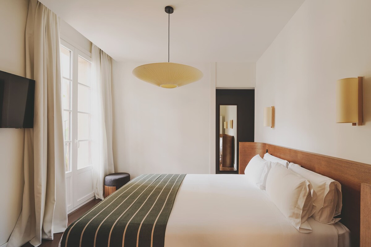 Ropa de cama de alta calidad y minibar 