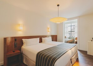 Ropa de cama de alta calidad y minibar 