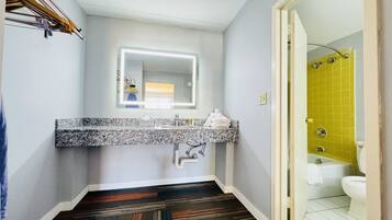 Suite, 1 King Bed with Sofa bed | Bathroom | Combined shower/bathtub, free toiletries, hair dryer, towels
