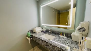 Room, 2 Double Beds | Bathroom | Combined shower/tub, free toiletries, hair dryer, towels