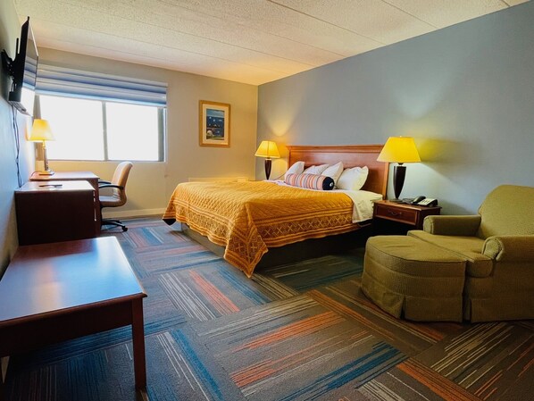 Habitación, 1 cama King size | Escritorio, espacio para trabajar con laptop y cortinas blackout 