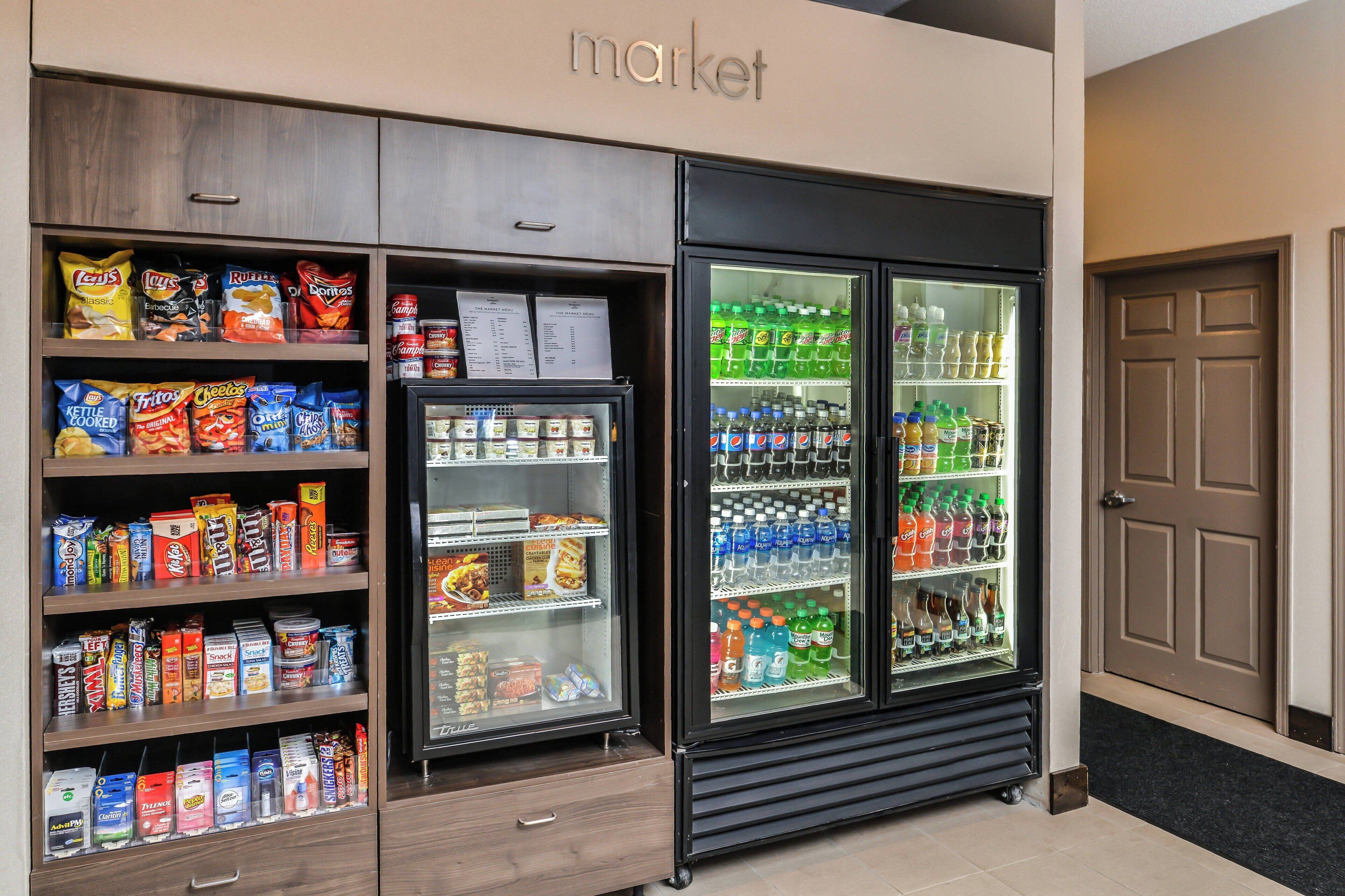 A vending machine area with snacks and beverages.