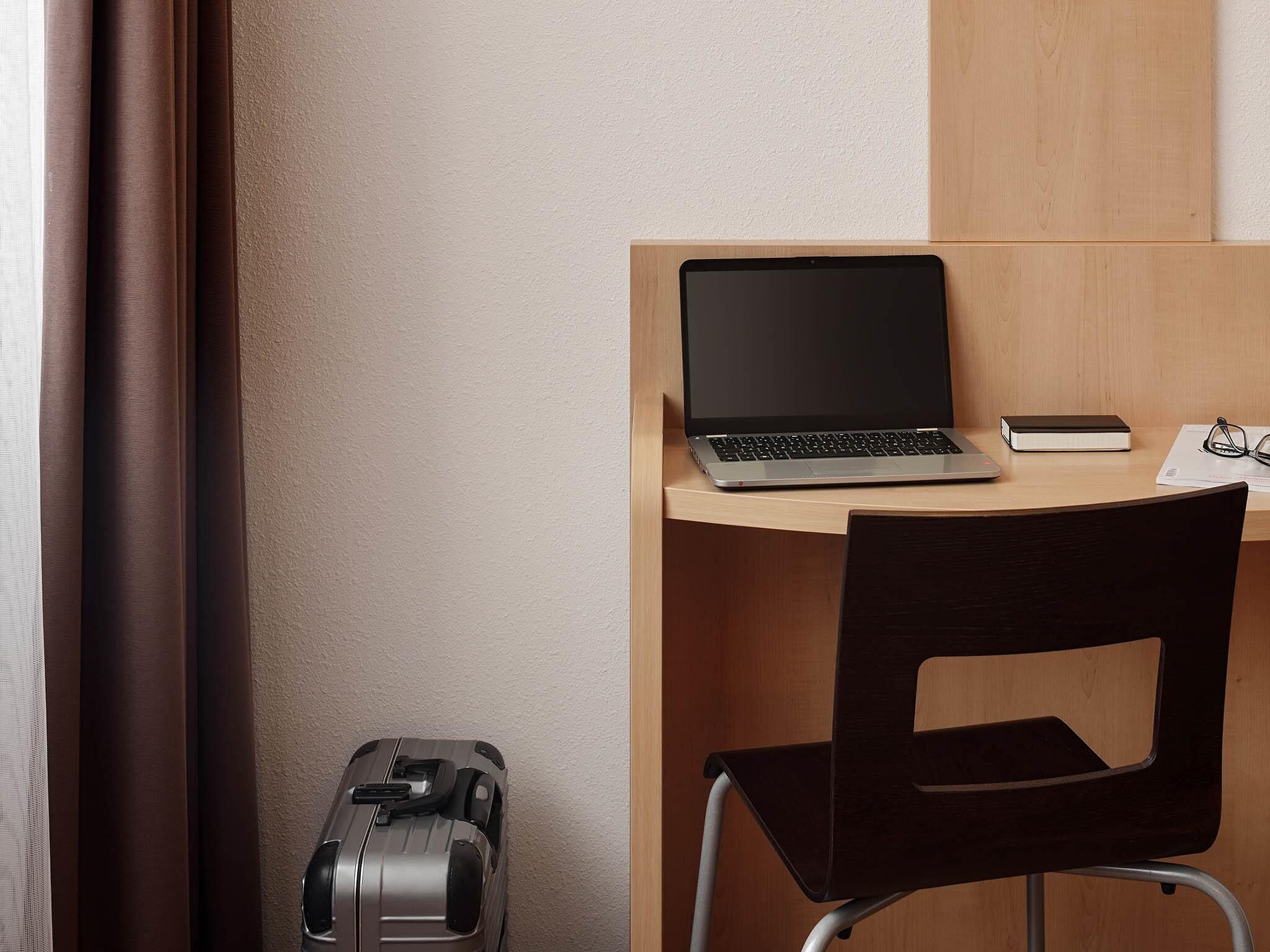Hypo-allergenic bedding, in-room safe, desk, laptop workspace