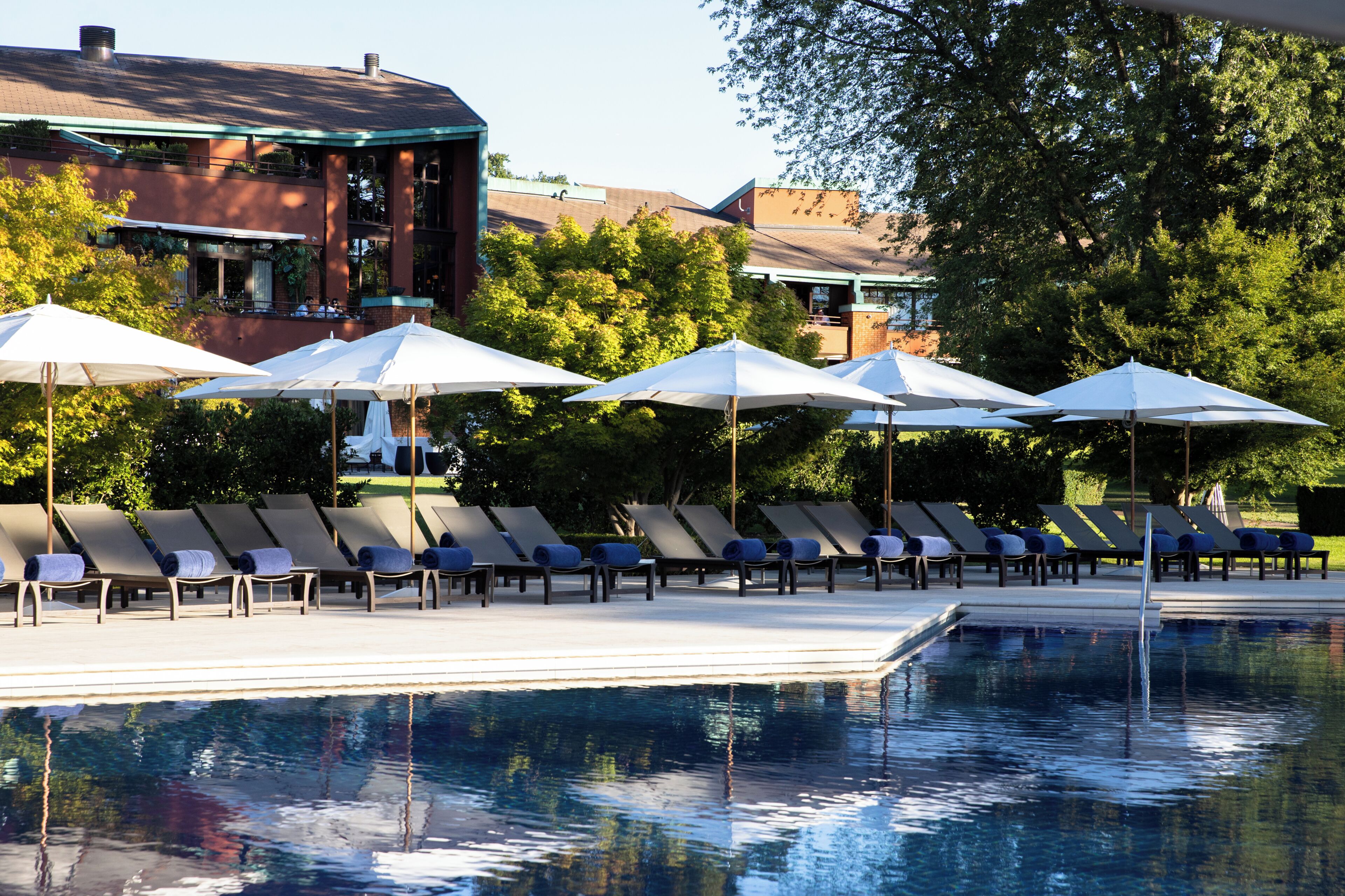 Indoor pool, seasonal outdoor pool, pool umbrellas, sun loungers
