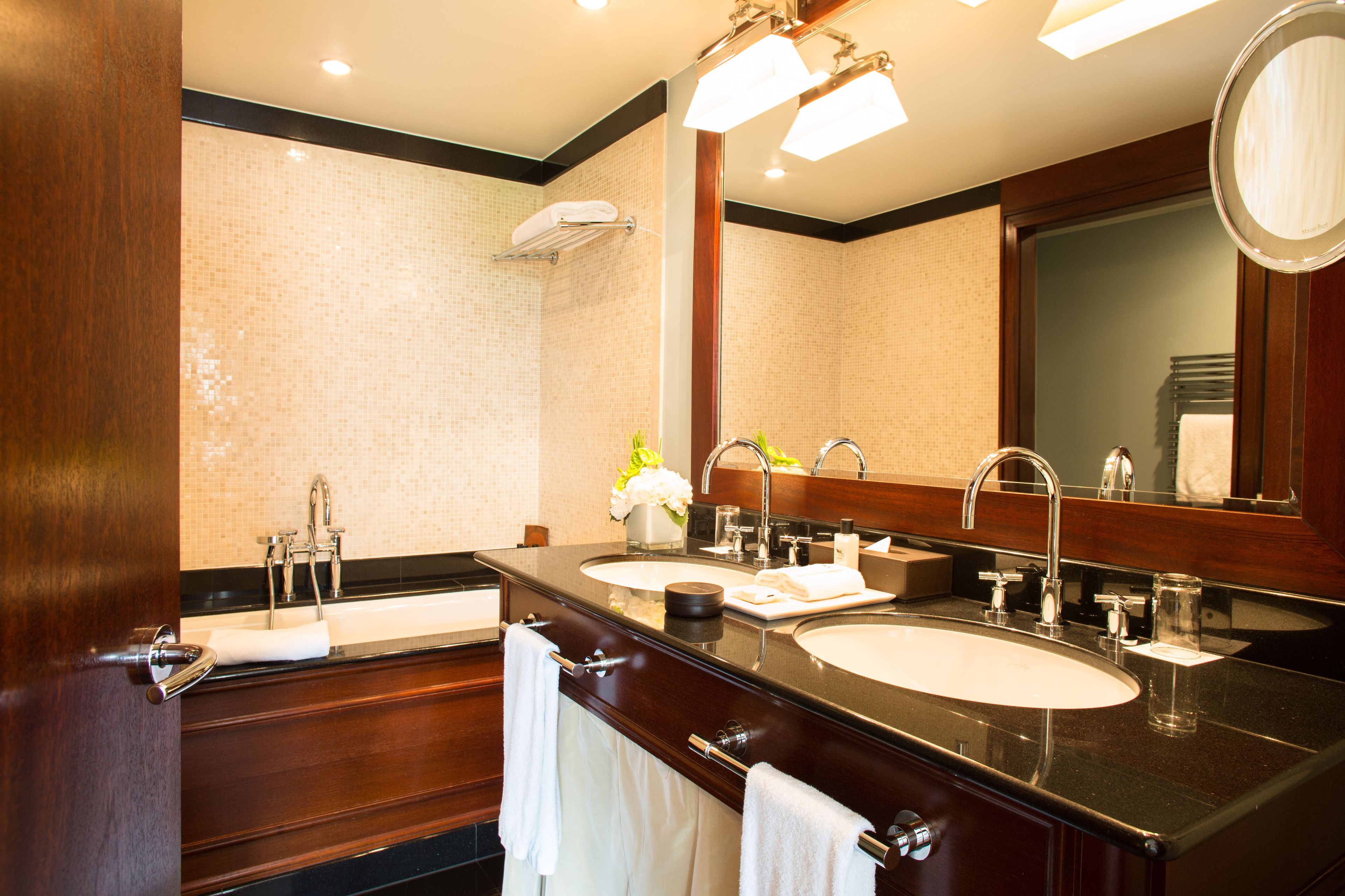 combined shower/bathtub, eco-friendly toiletries, hair dryer, bathrobes