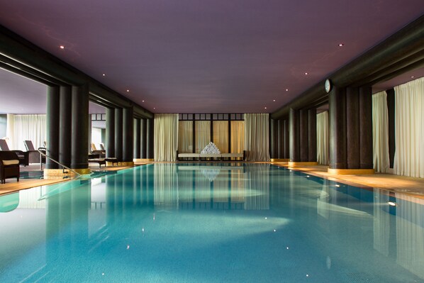 Indoor pool, seasonal outdoor pool, pool umbrellas, pool loungers