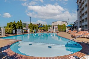 Seasonal outdoor pool, pool loungers