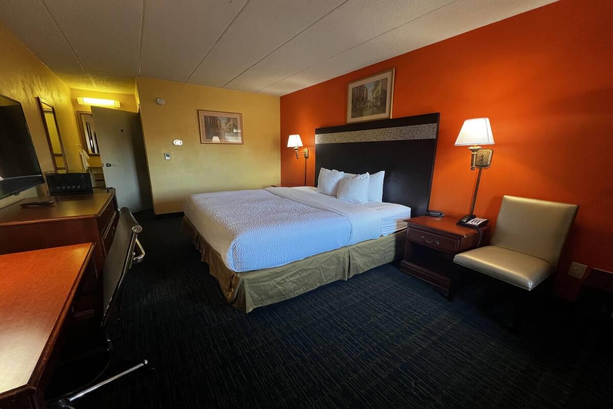 In-room safe, desk, iron/ironing board, cribs (free)