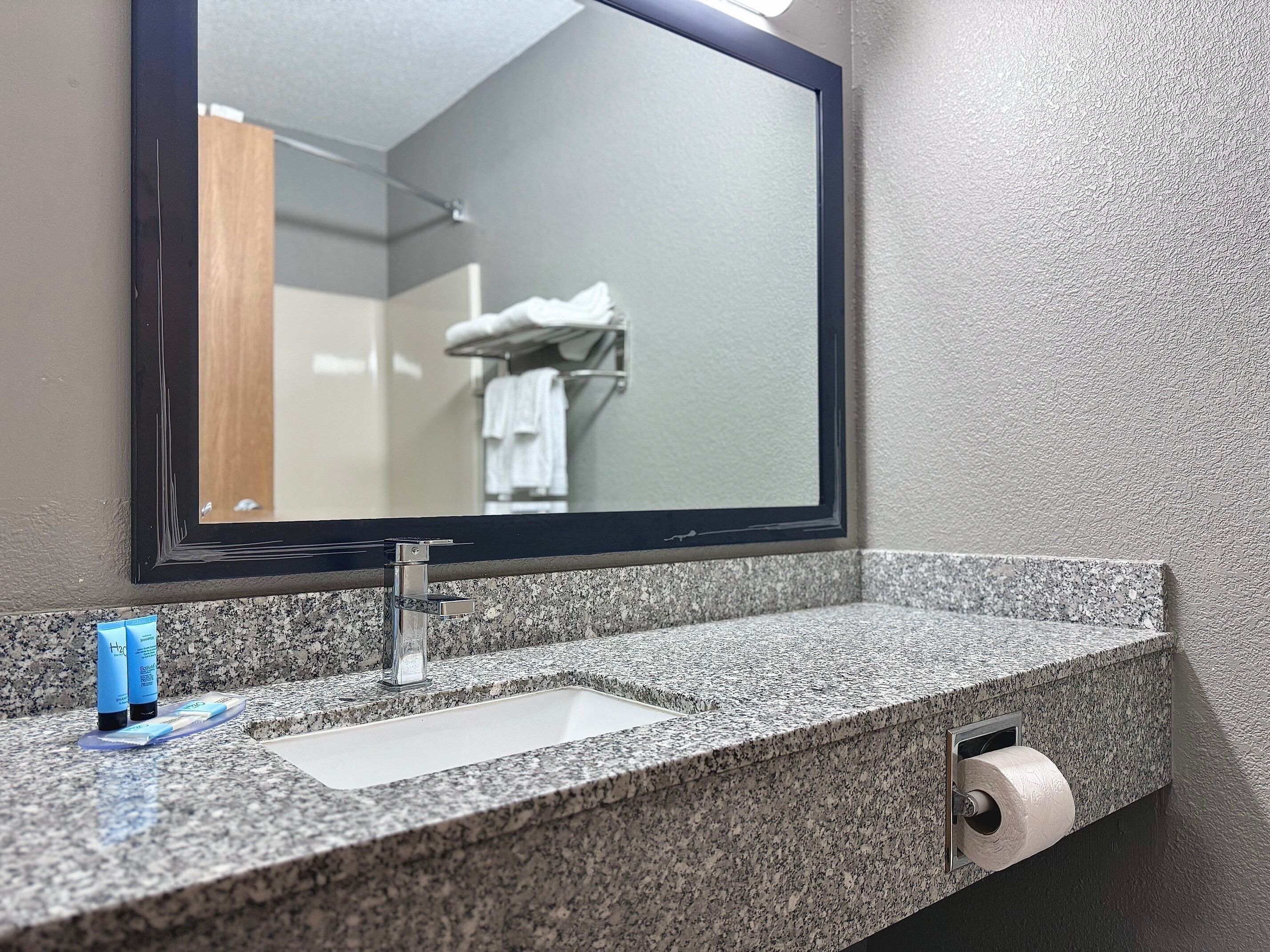 combined shower/bathtub, eco-friendly toiletries, hair dryer, towels