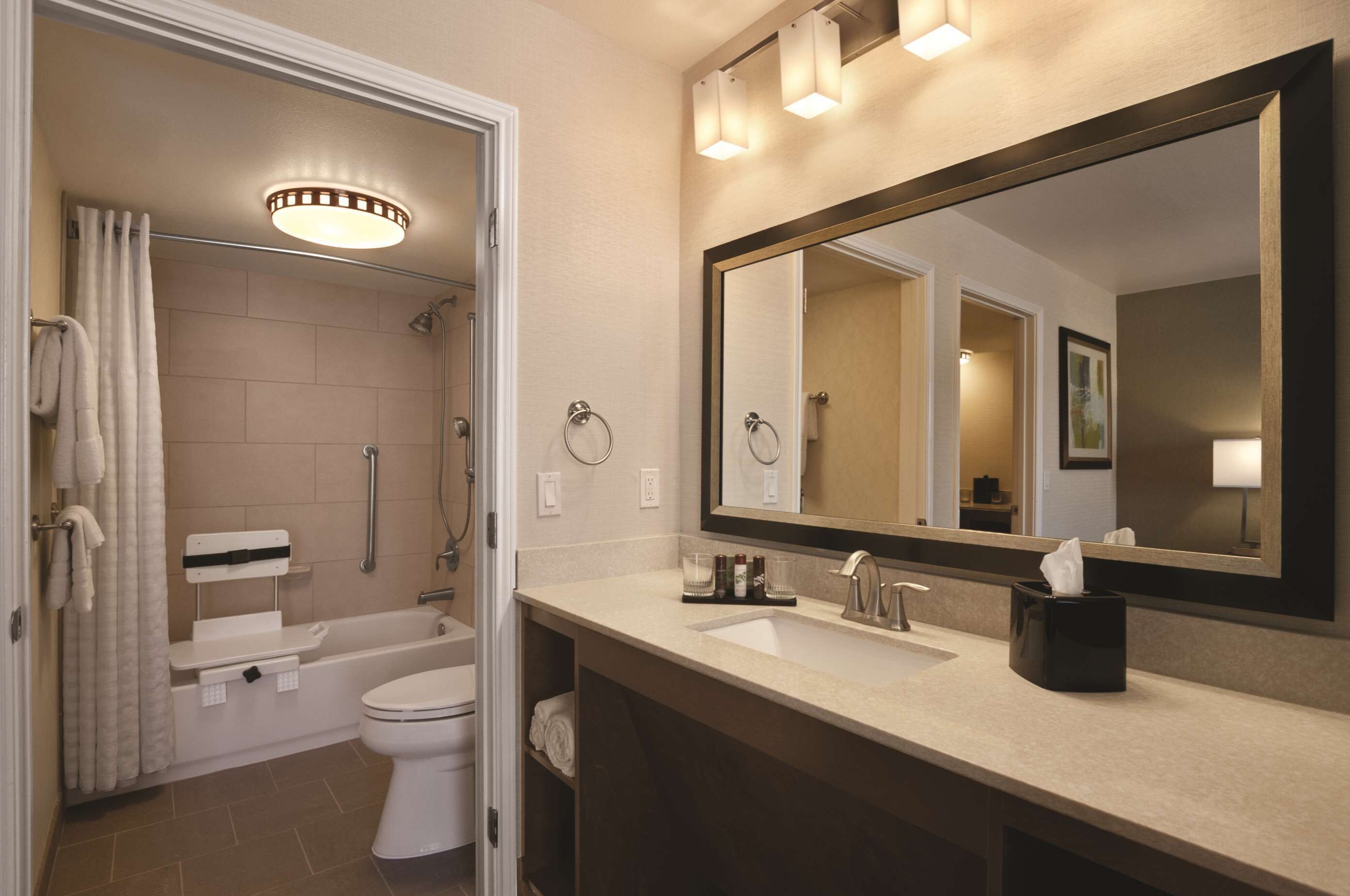 eco-friendly toiletries, hair dryer, towels