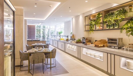 Daily buffet breakfast (EUR 18 per person)