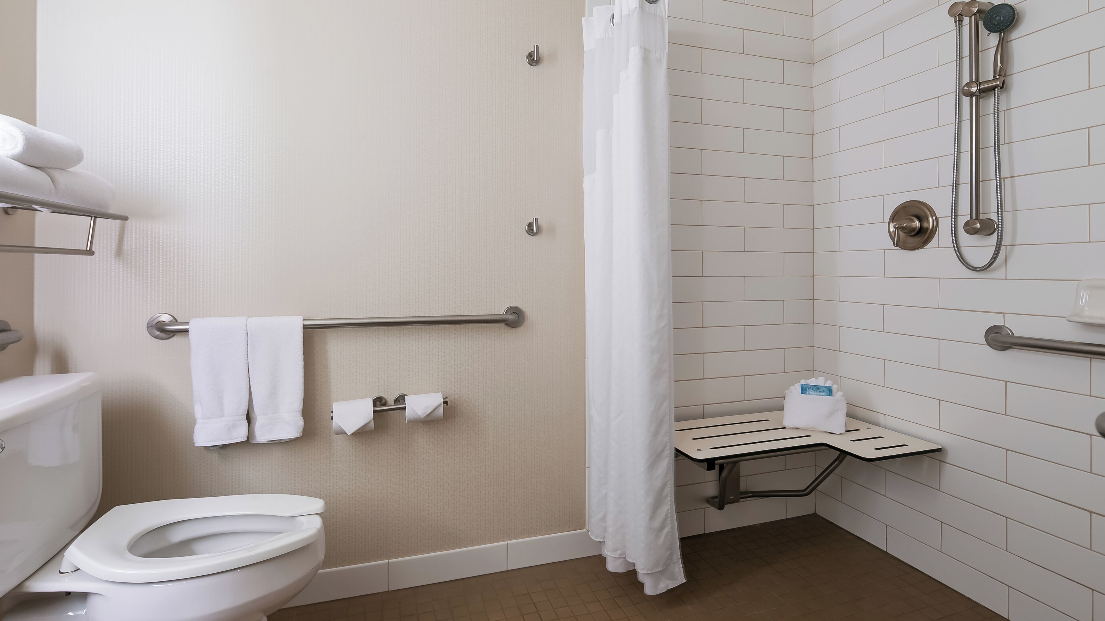 eco-friendly toiletries, hair dryer, towels