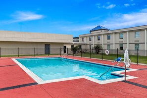 Seasonal outdoor pool, open 10 AM to 6 PM, pool loungers