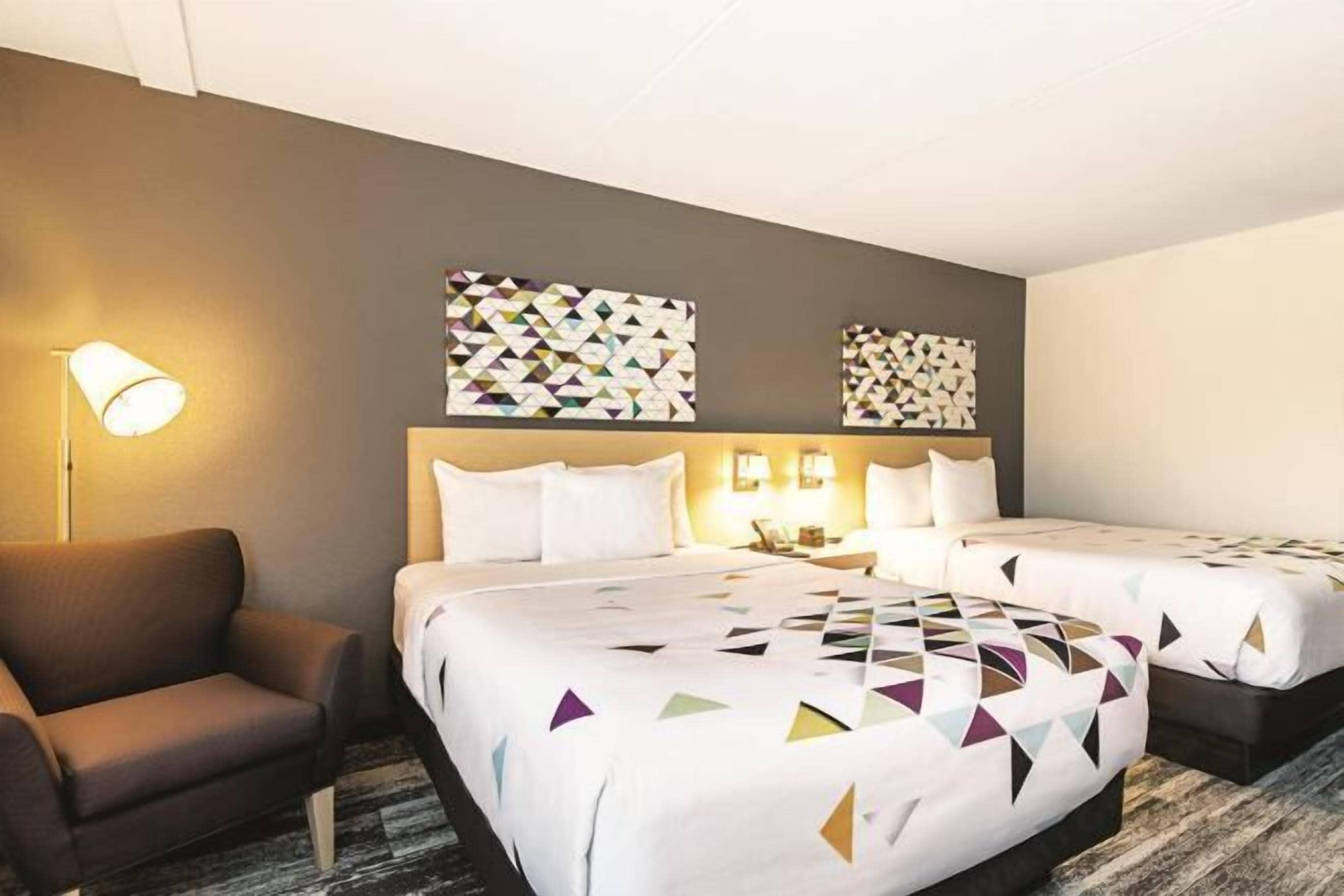 Desk, laptop workspace, blackout drapes, iron/ironing board