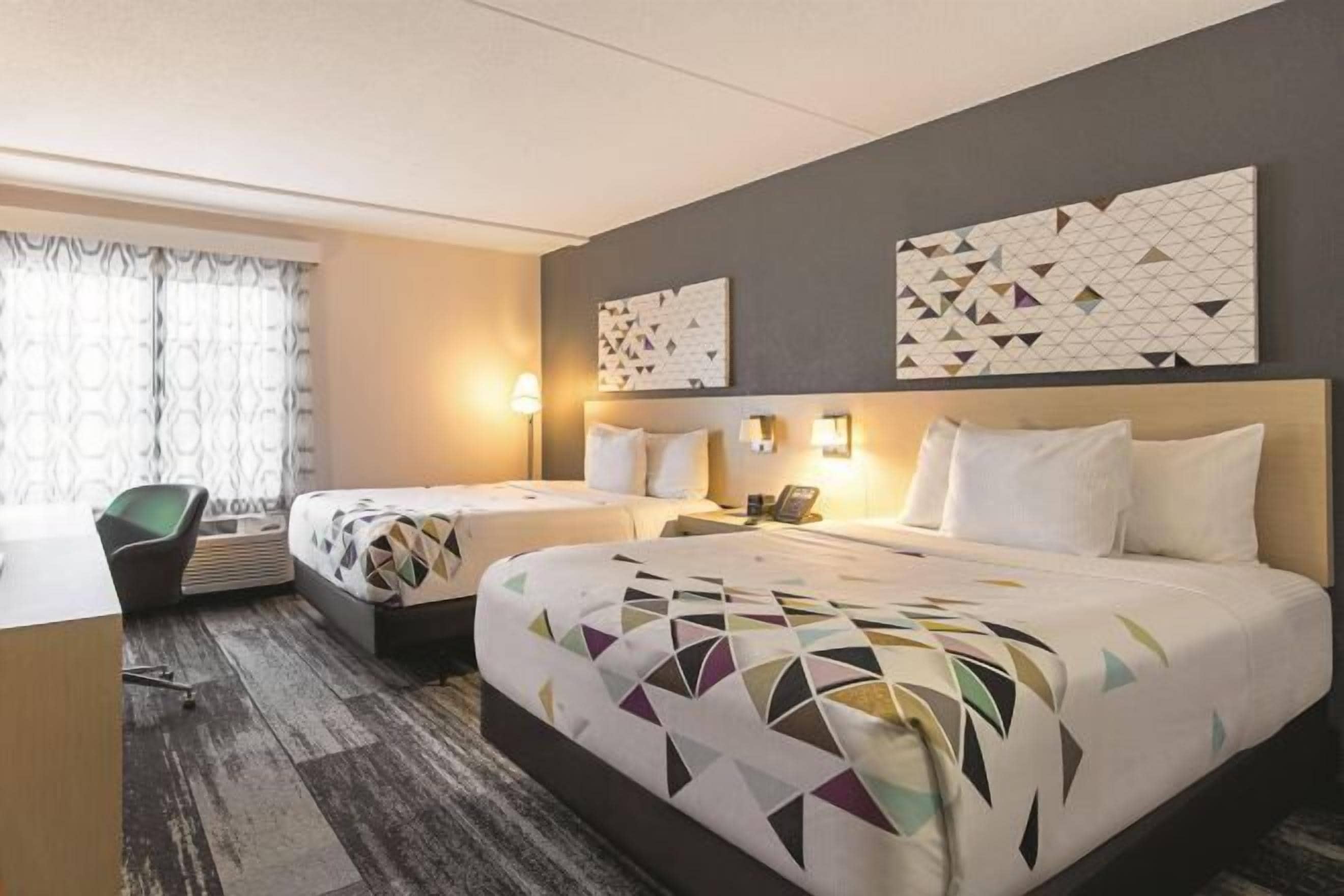 Desk, laptop workspace, blackout drapes, iron/ironing board