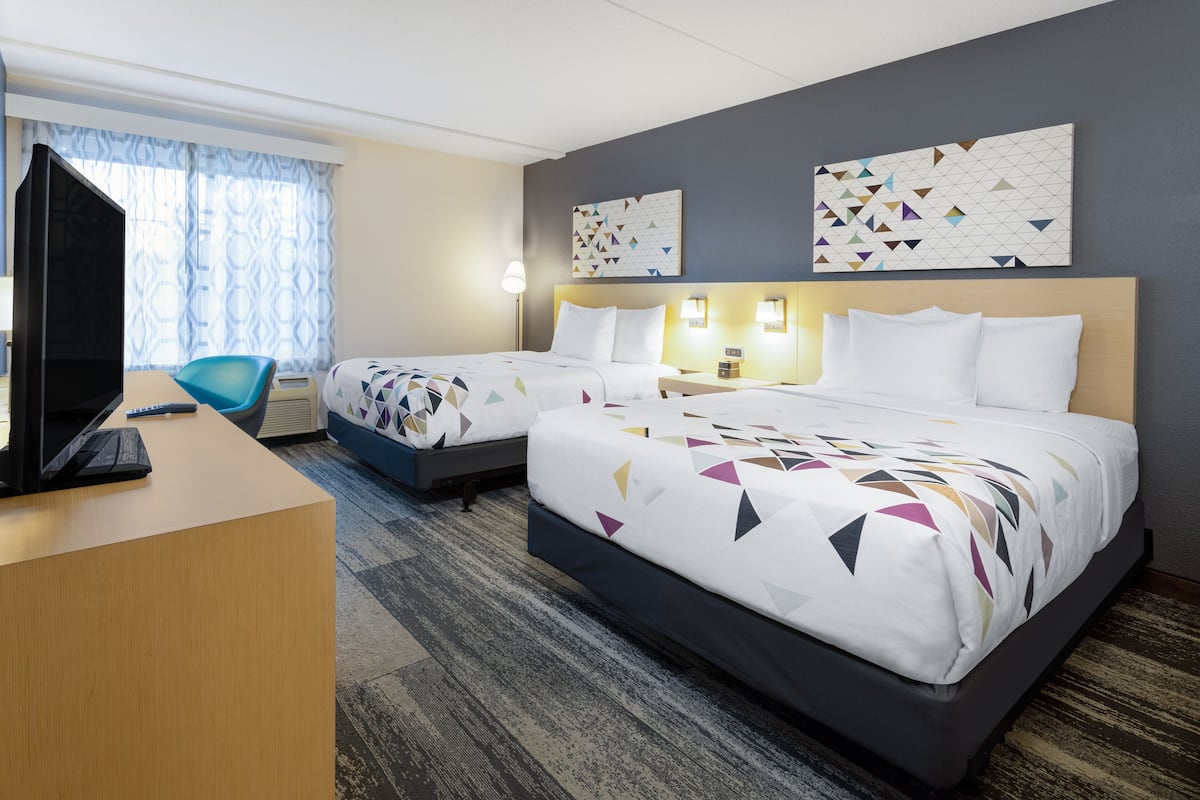 desk, laptop workspace, blackout curtains, iron/ironing board