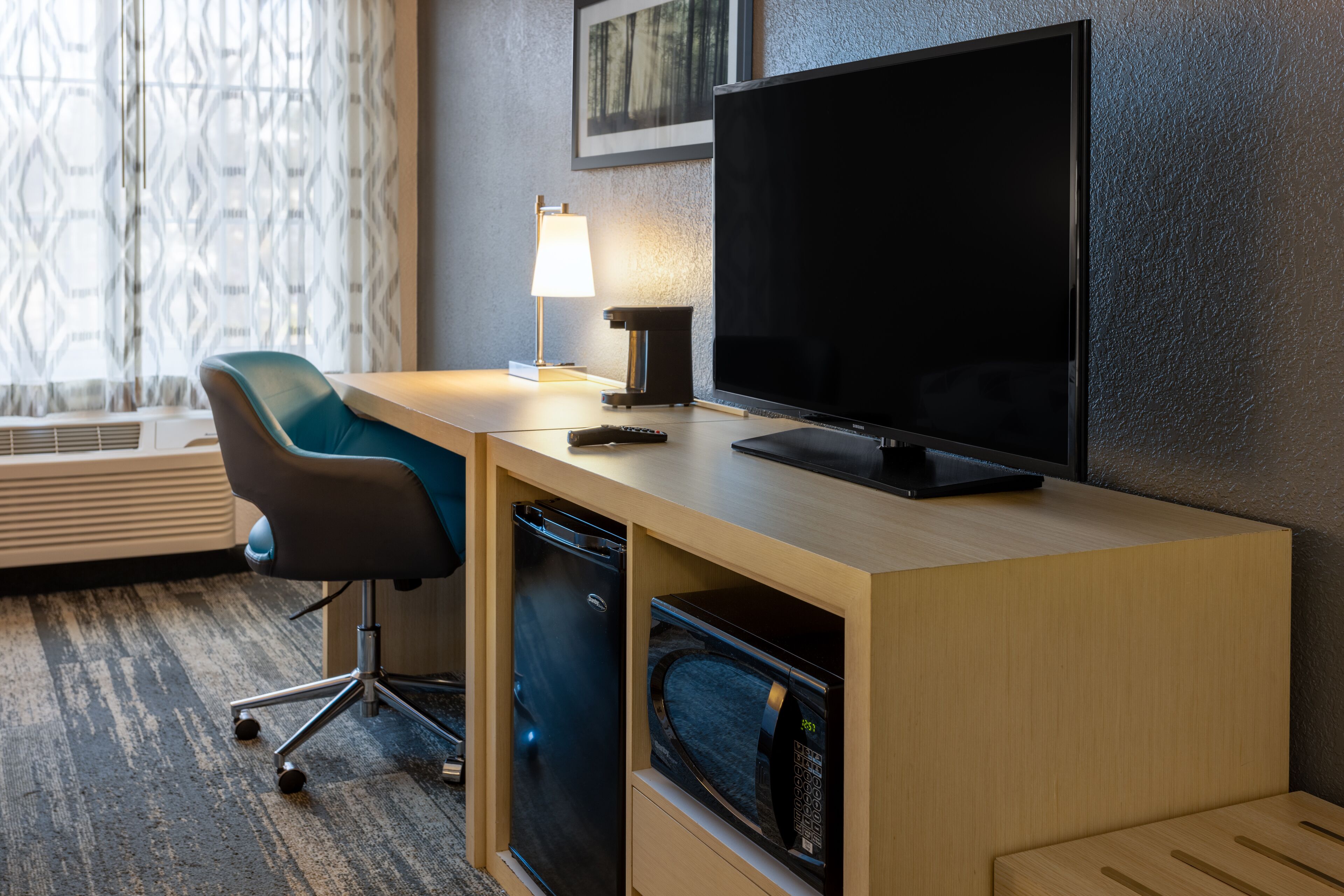 desk, laptop workspace, blackout curtains, iron/ironing board