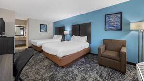 A hotel room with two beds, a desk, a chair, and a TV. - Best Western Fairwinds Inn (Cullman)
