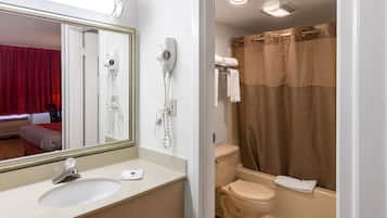 Bathtub, eco-friendly toiletries, towels