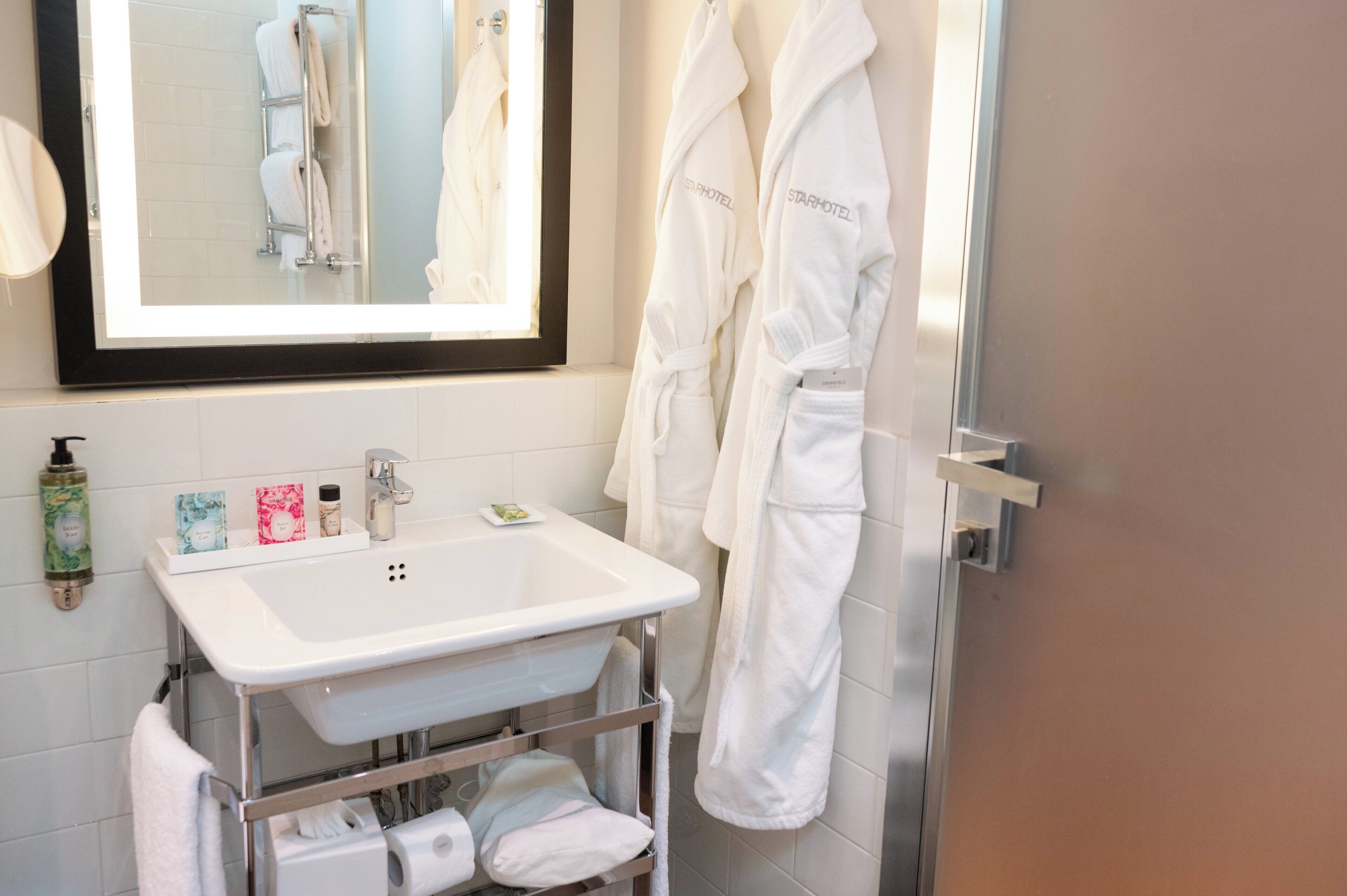 hair dryer, bidet, towels